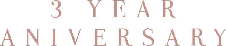 Text reading '3 Year Anniversary' in pinkish-brown letters on a black background.