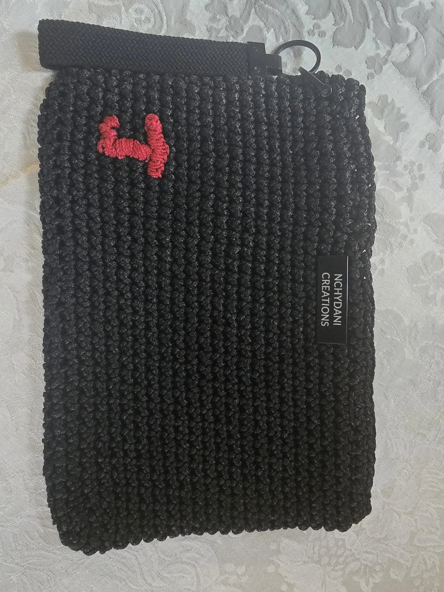 The Crimson Mark Carry Pouch