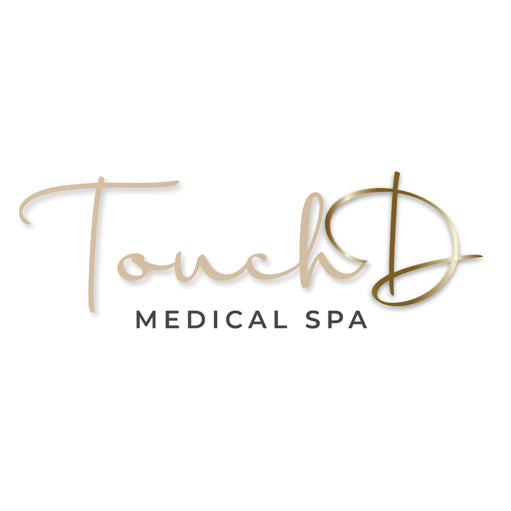 Sign for Touch Medical Spa with stylish cursive font and logo