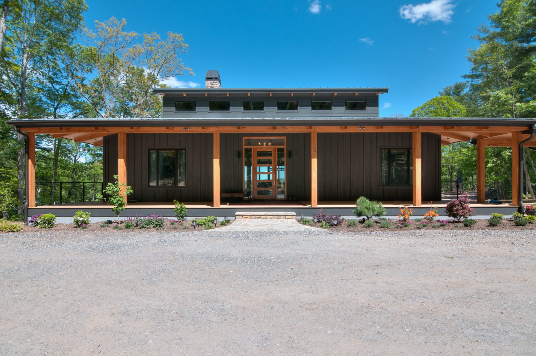 Modern high-performance mountain home with metal roof built by Timber Creek Construction.