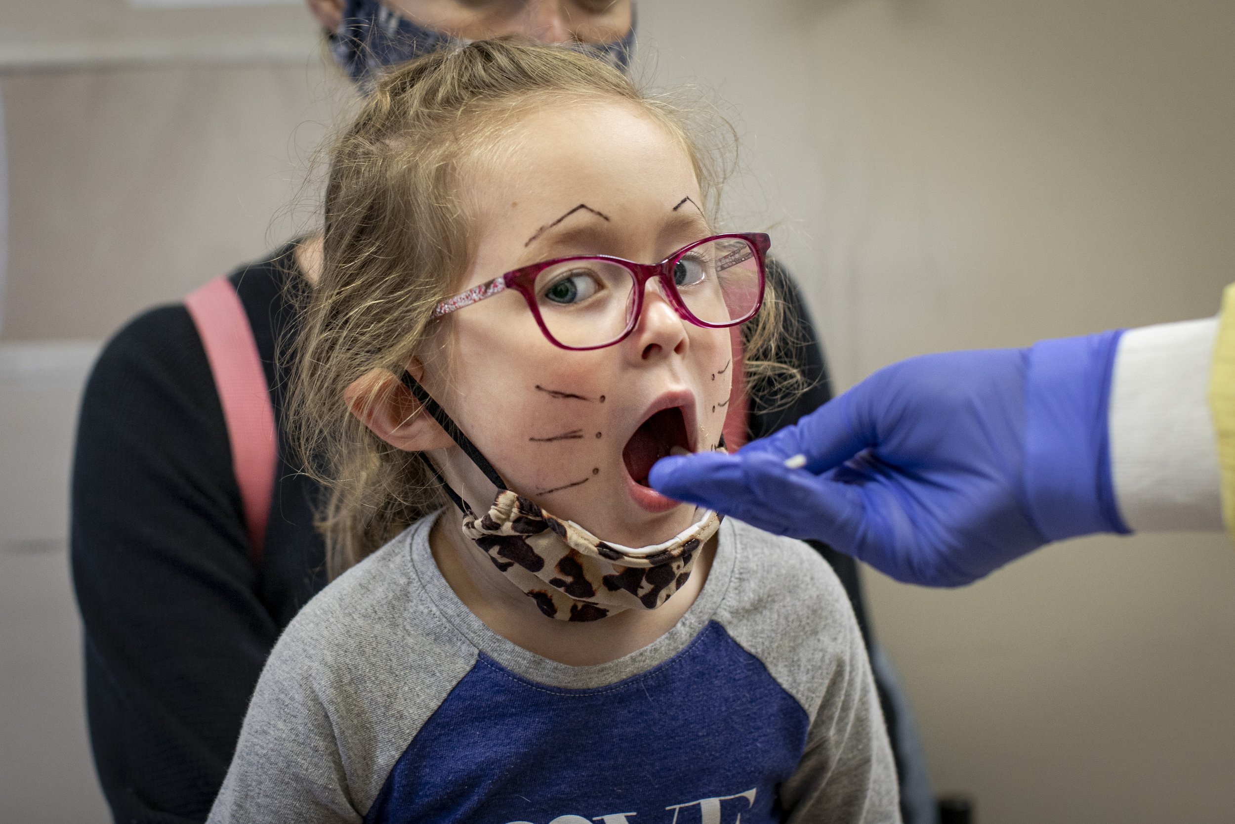 Sasha Mitsui  gets a COVID-19 swab at Michael Garron Hospital on Aug. 1, 2021.