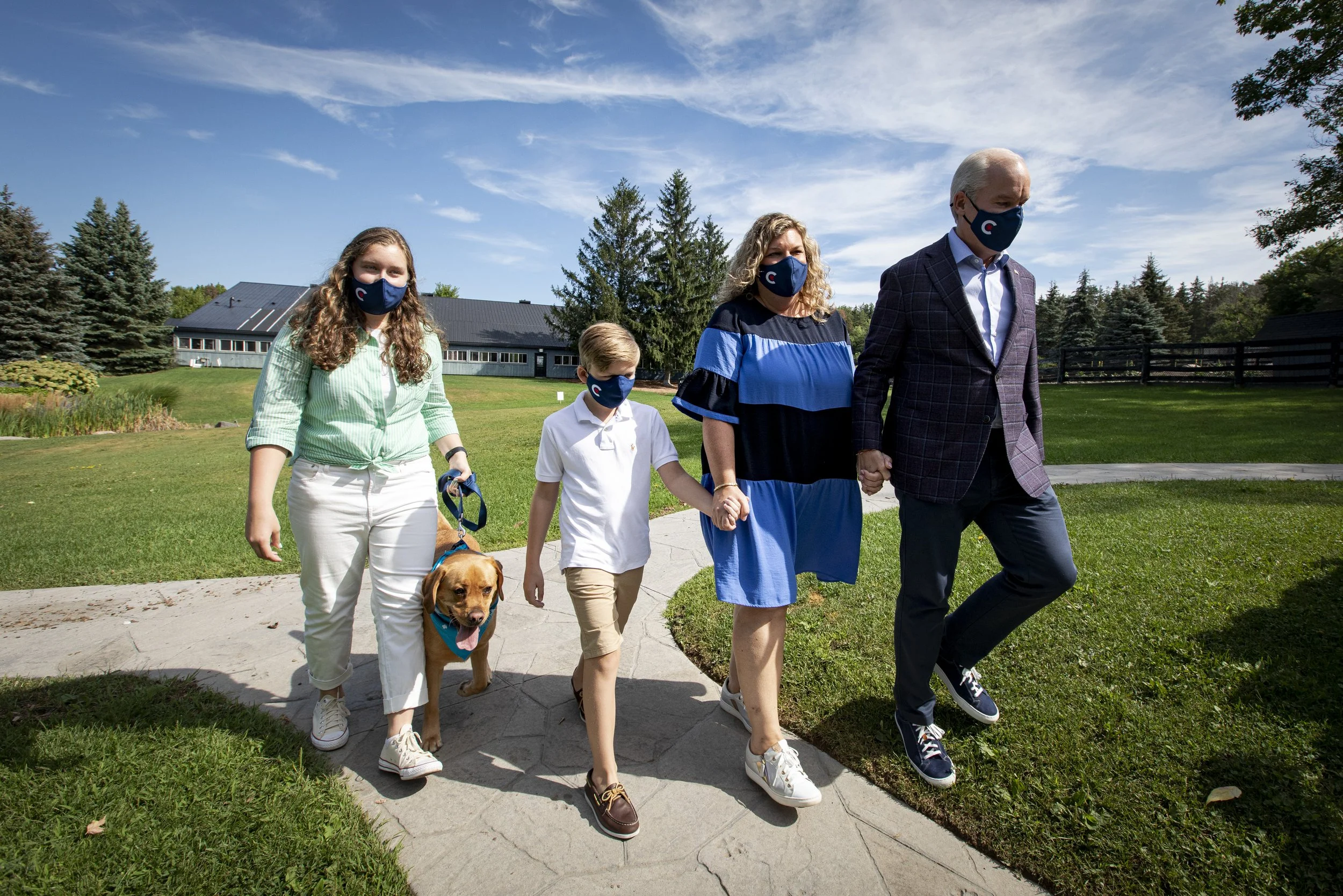 Conservative party Leader Erin O’Toole, along with his family, attend a campaign stop at Dog Tales rescue sanctuary, in King City, Ont., on Aug. 30, 2021.