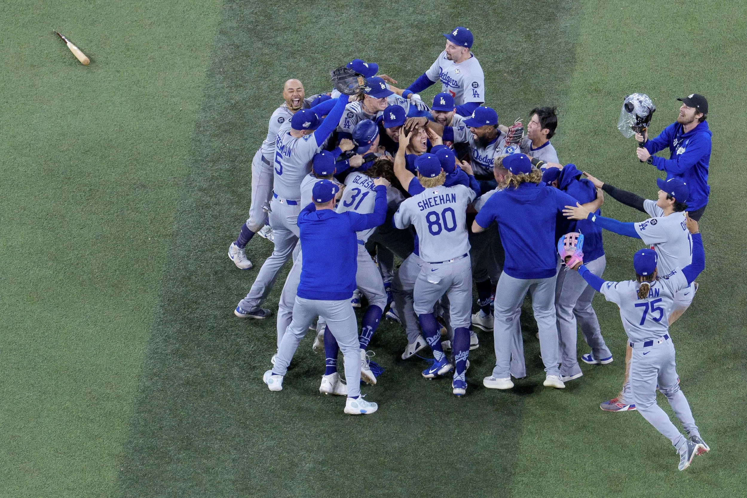 Broken bat, L.A. Dodgers' pitcher Yoshinobu Yamamoto clinches the World Series over the Blue Jays, Nov. 2, 2025.