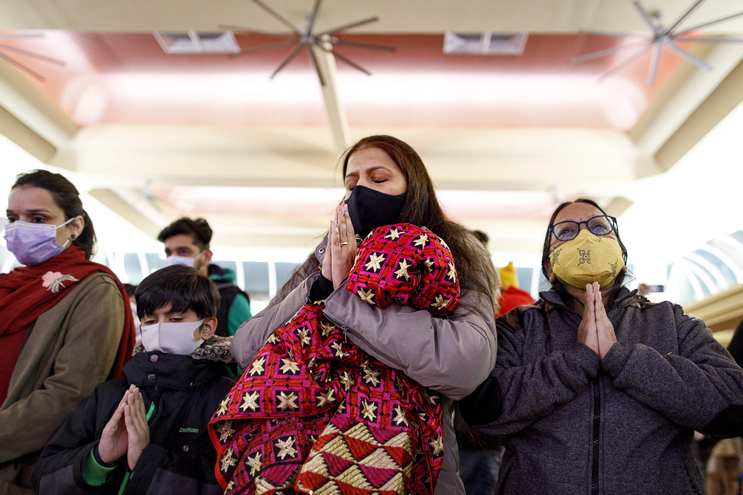 Devotees attend a Diwali prayer at the Hindu Sabha temple, in Brampton, on Nov. 4, 2021.