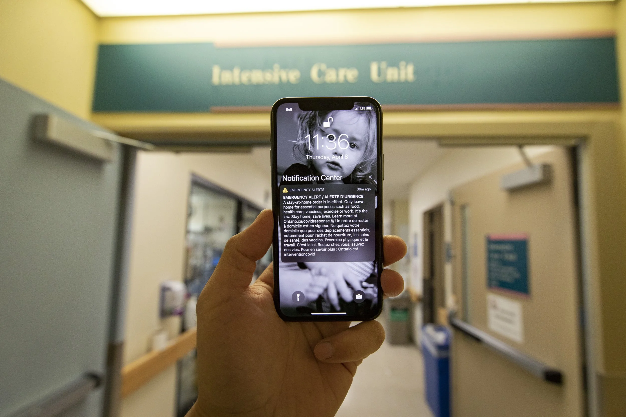 An emergency alert notifying Ontarians of a stay-at-home orders is pictured on the photographer's iPhone while inside Centenary Hospital, in Scarborough, on Apr. 8, 2021.