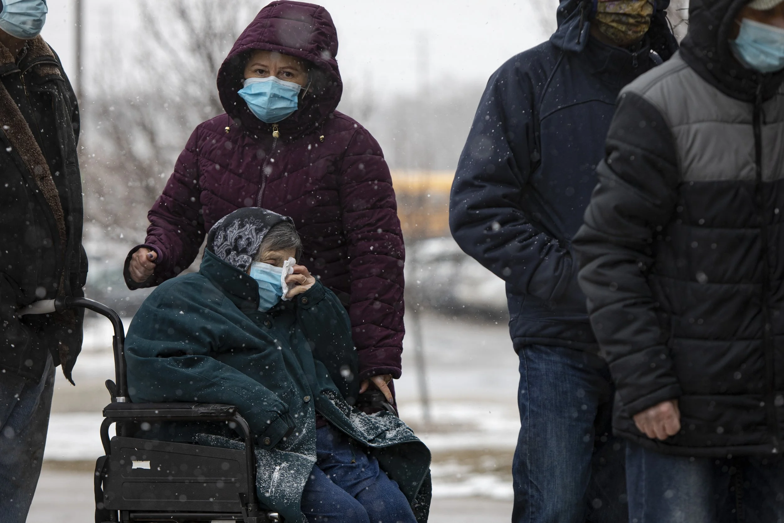 Seniors and their caregivers line up for a mass vaccination clinic at the Richmond Green Sports Centre, in Richmond Hill, Ont., on March 1, 2021.