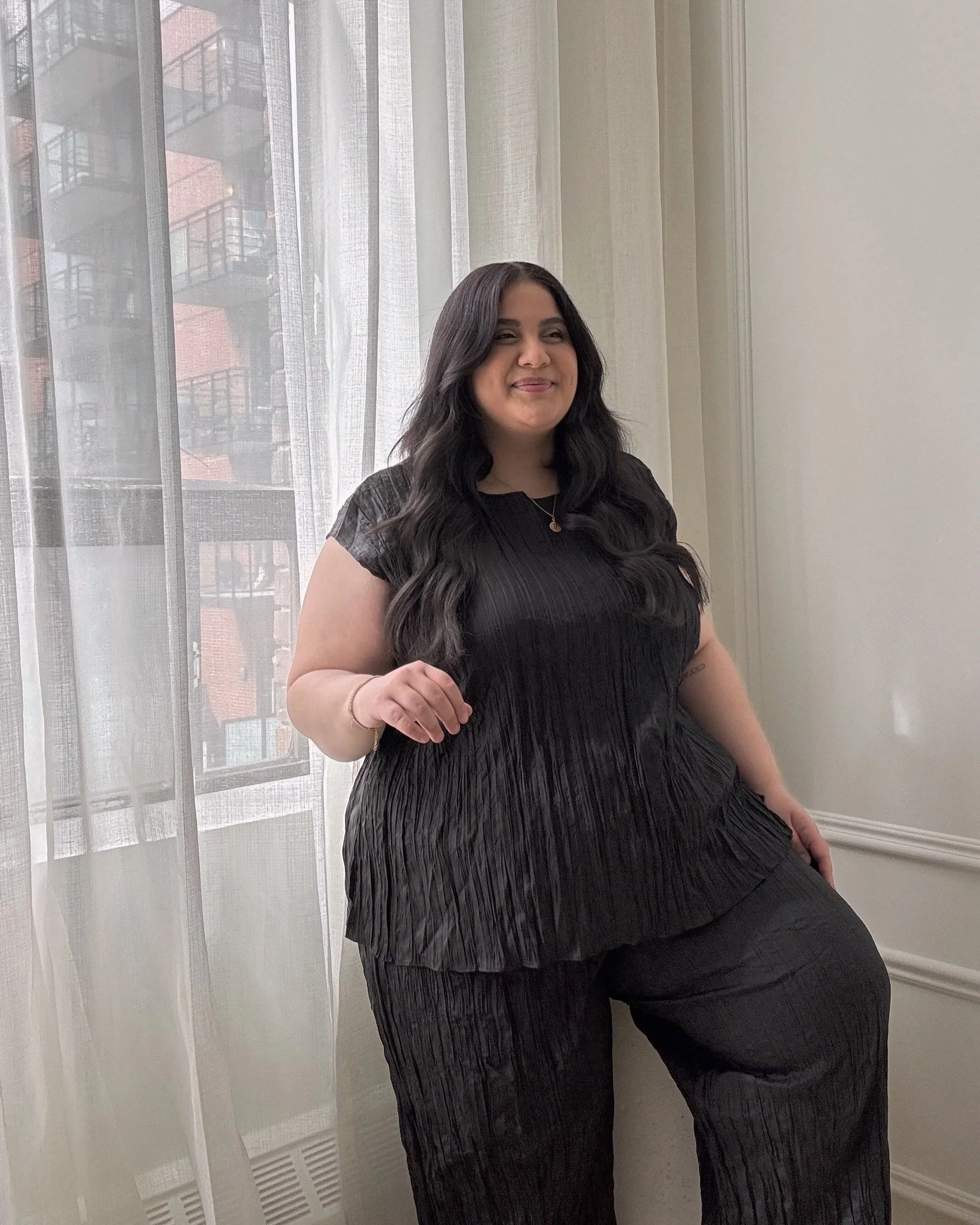 Hina Low, a plus sized personal stylist who specializes in size inclusive styling.