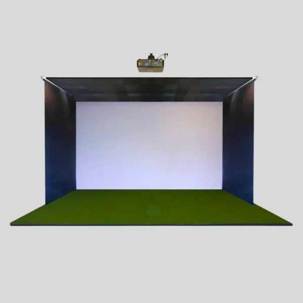 Empty indoor golf simulator with a white screen, black walls, and a green turf floor. Overhead projector mounted on the ceiling.
