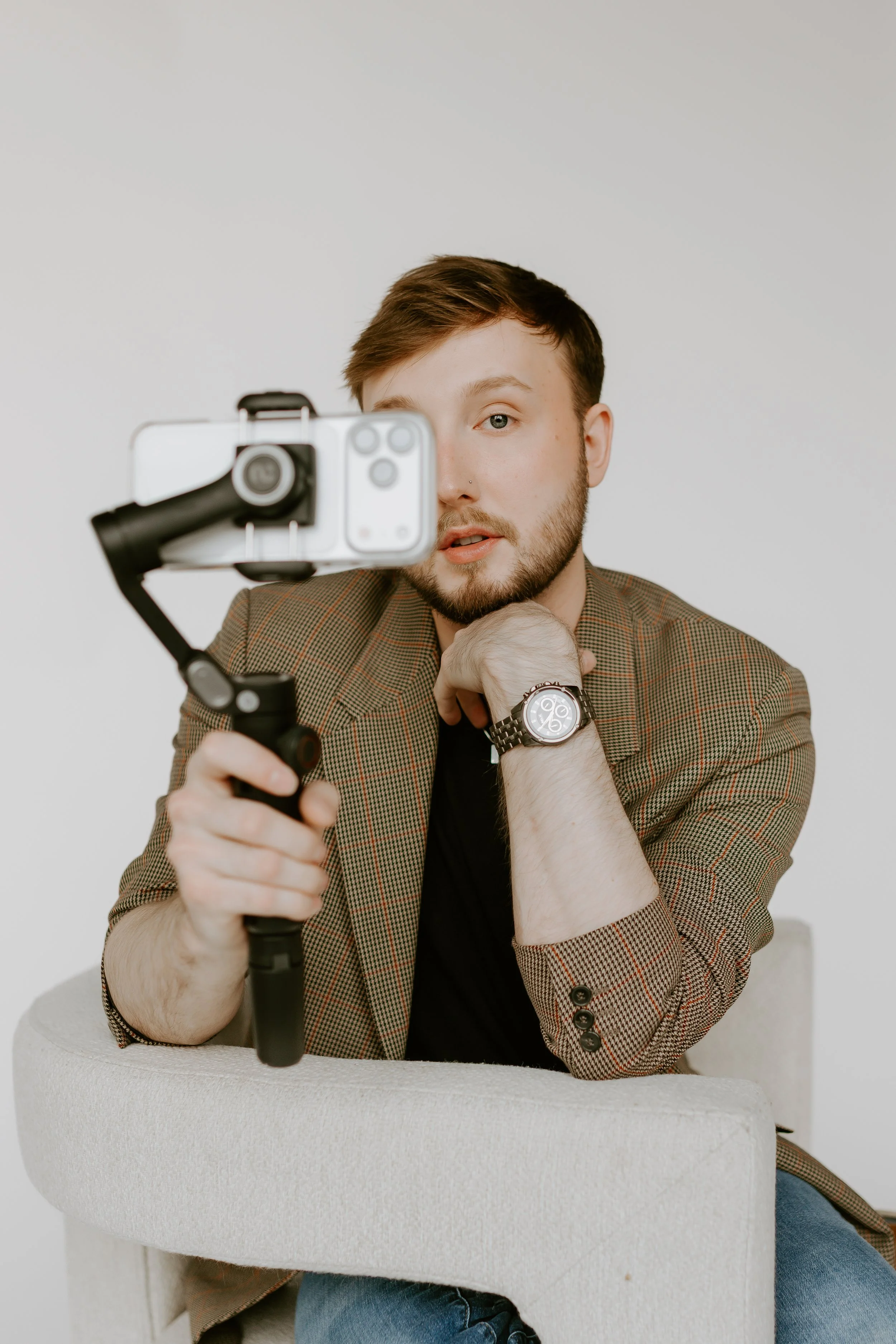 William Randall filming social media content with camera setup.