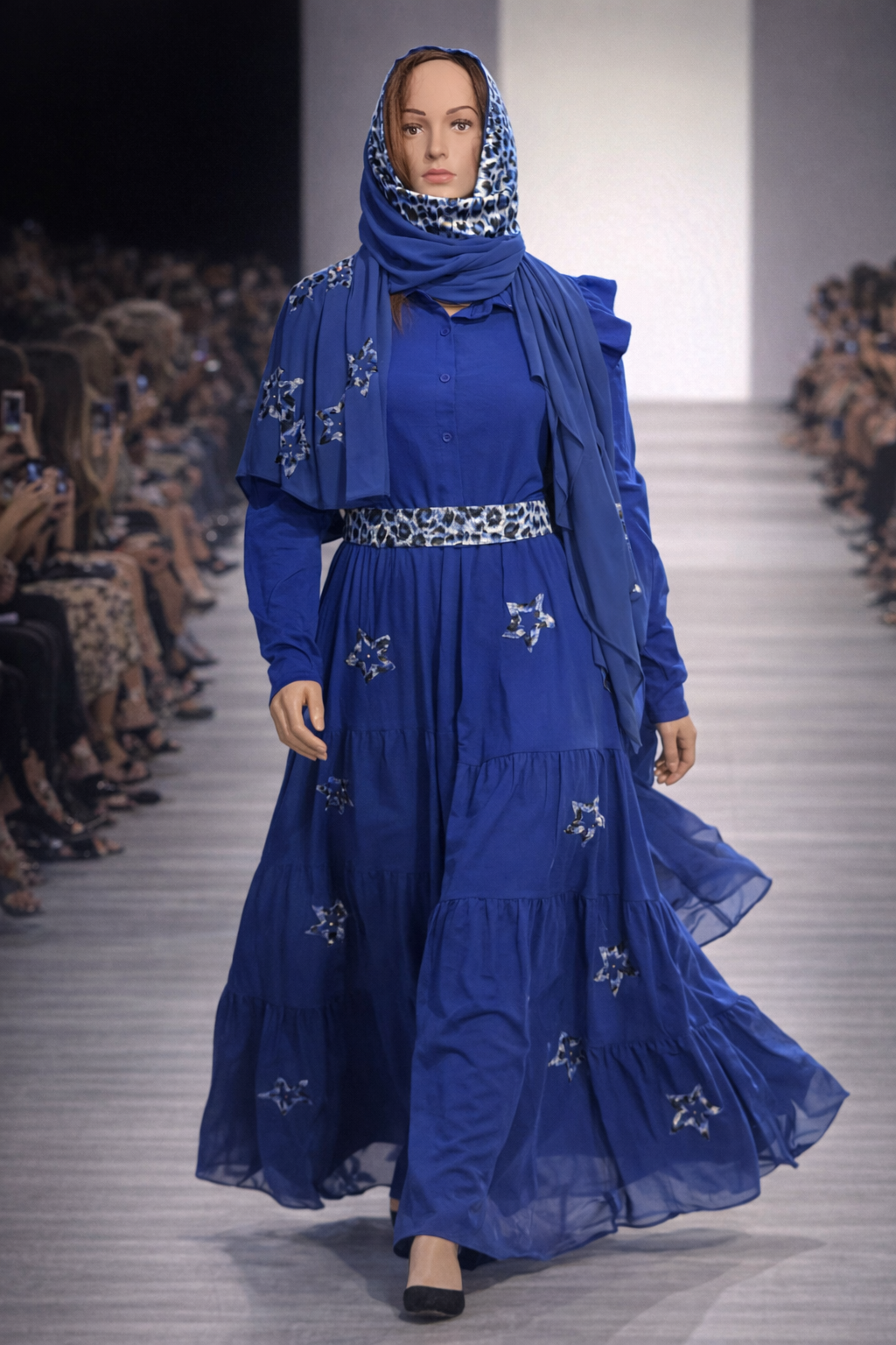 1. Royal Blue Embellished Gown Flowing sapphire gown with delicate embroidered details and matching scarf.