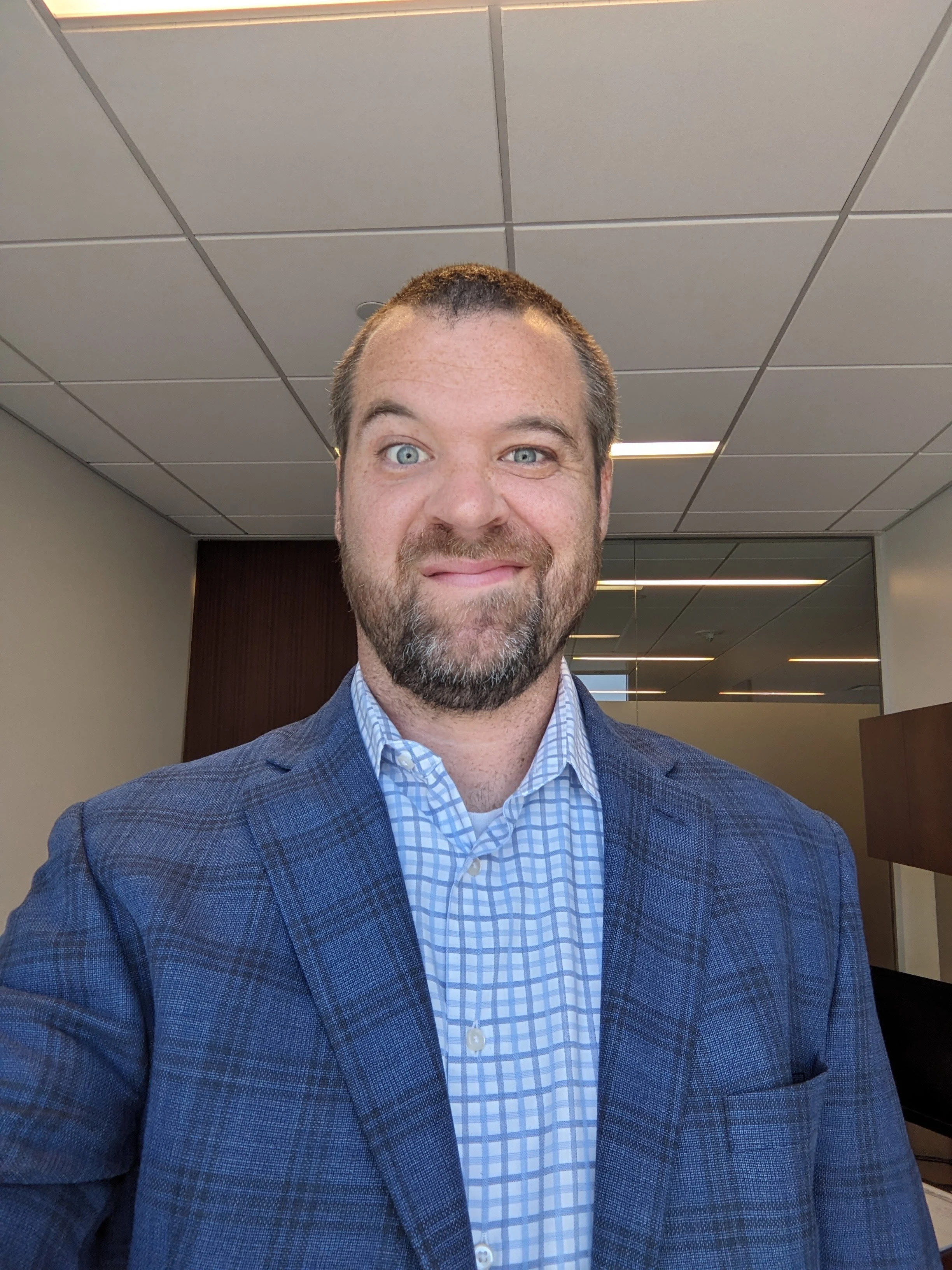 Corporate man making a silly face