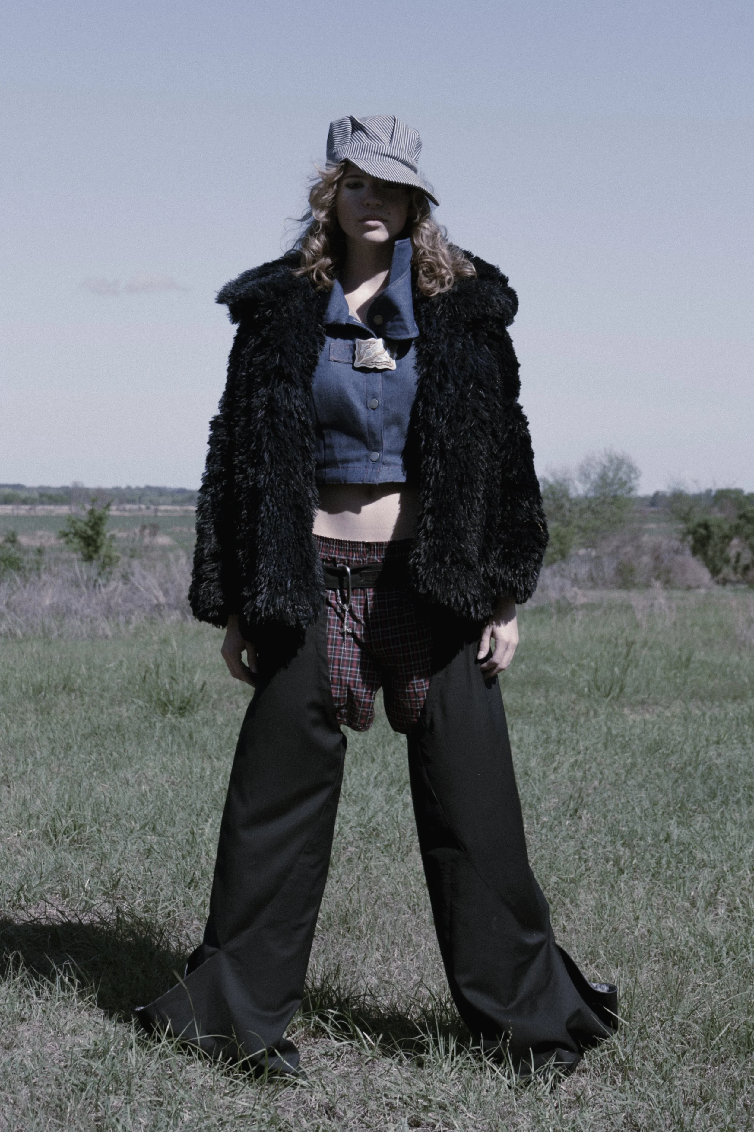 Styled with customized antique railroader cap and classic tartan boxer.