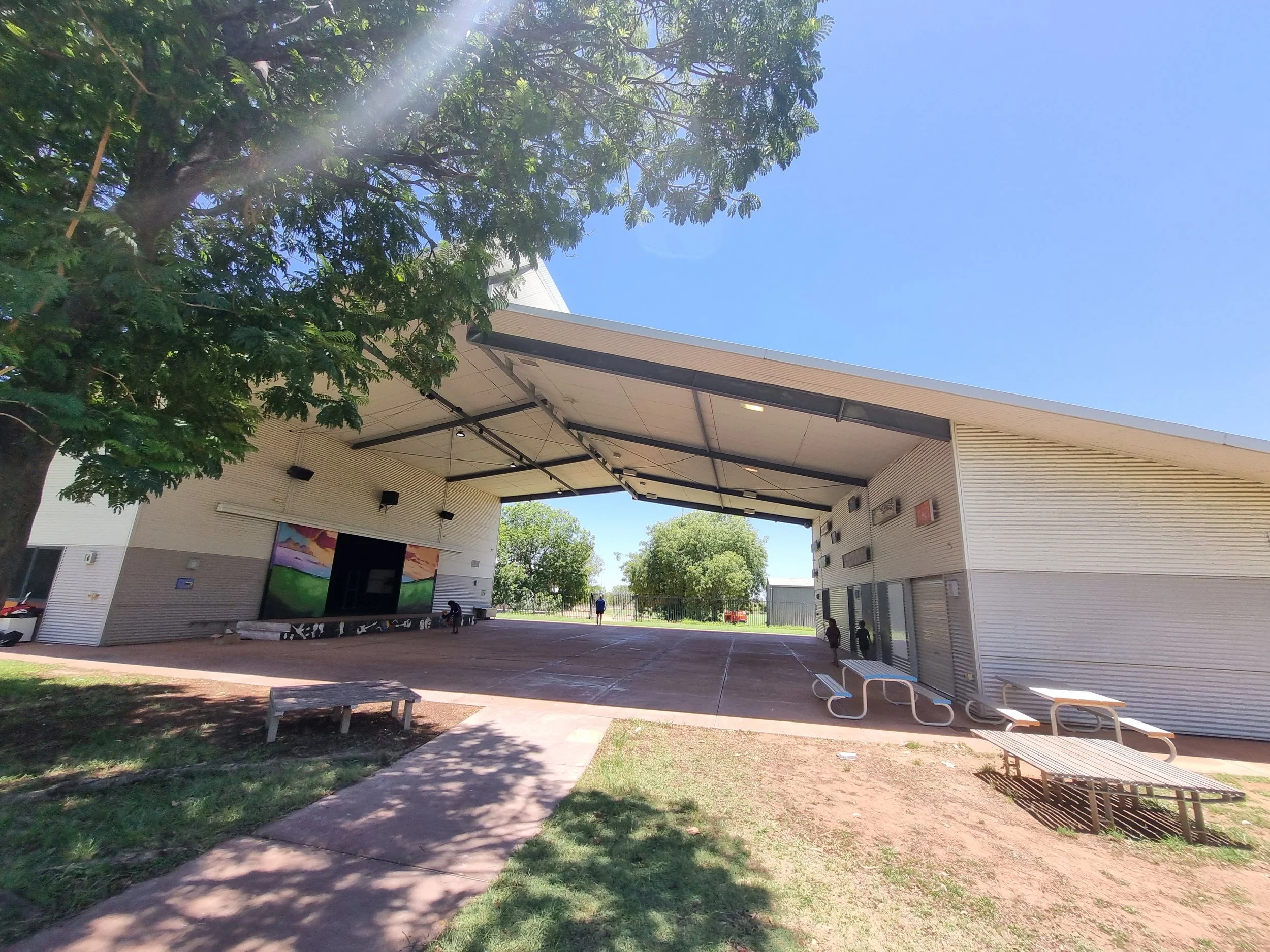 Community facility in the Kimberley with covered outdoor stage and breezeway, assessed by Cooee Constructions