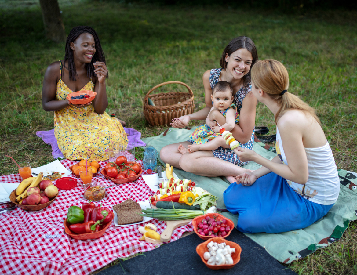 Working moms having picnic