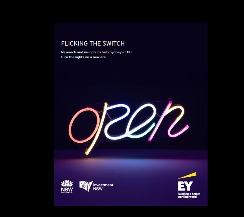 Neon sign spelling 'open' in colorful cursive letters against a dark background.
