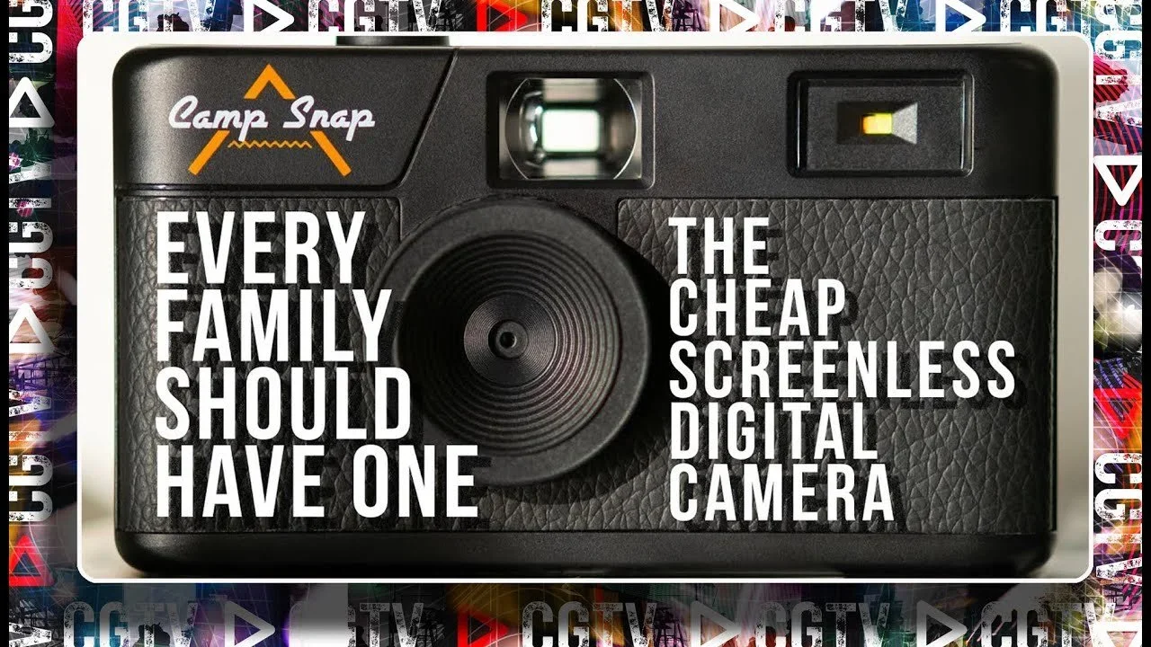 Close-up of a vintage digital camera with the text: "Every family should have one" and "The cheap screenless digital camera" on the front.