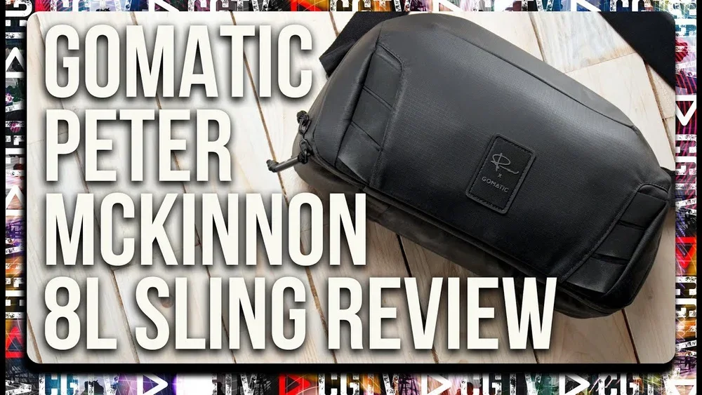 A black Gomatic Peter McKinnon 8L sling bag on a wooden surface with bold white text overlay that reads "Gomatic Peter McKinnon 8L Sling Review".
