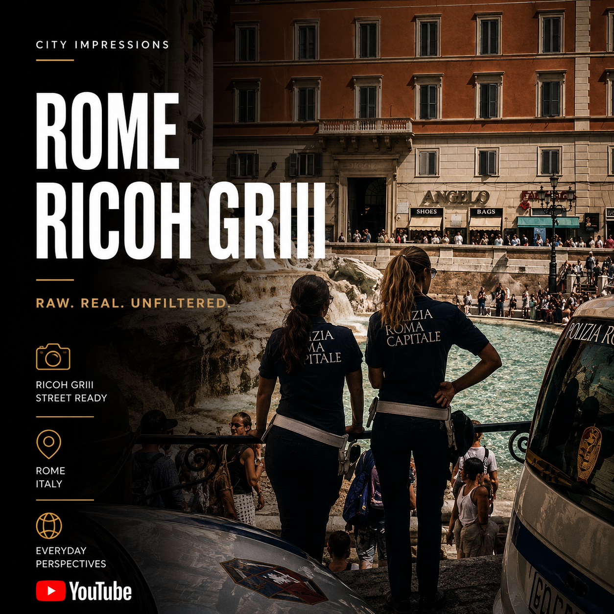 Two female police officers from Polizia Roma Capitale stand on a ledge overlooking the Trevi Fountain in Rome, Italy. The fountain's sculptures and water feature are visible, with tourists sitting and standing on the steps behind it. parked cars with
