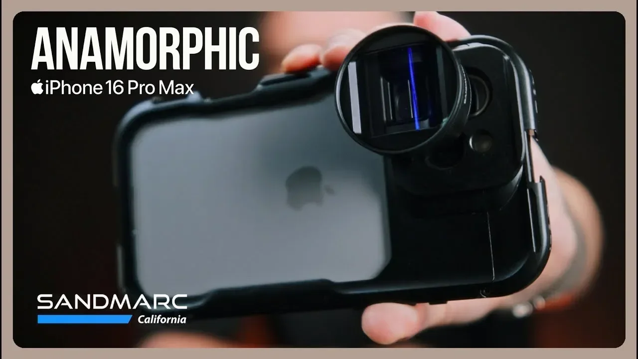 Close-up of an iPhone 16 Pro Max with a laser sensor device attached to the top, used for 3D mapping or scanning, held by a person's hand.
