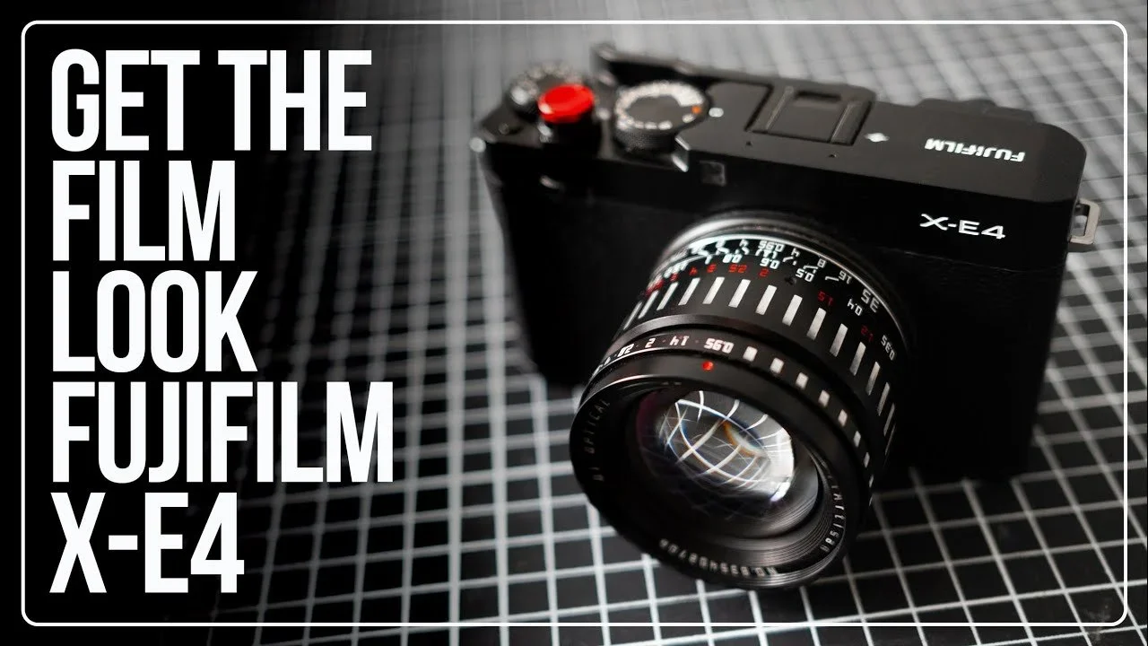 Fujifilm X-E4 camera with lens on a black and white grid background