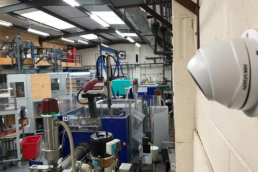 Industrial manufacturing setup with machines, tools, and equipment in a factory environment.