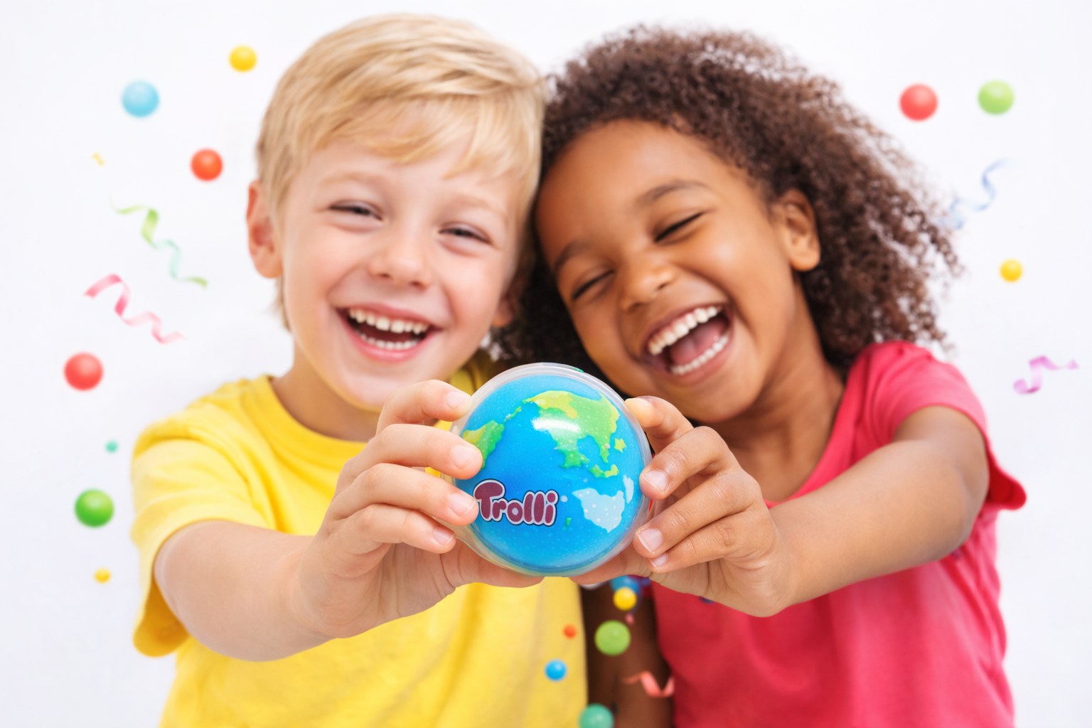 Kids enjoying colourful candy and Trolli Earth Gummies.