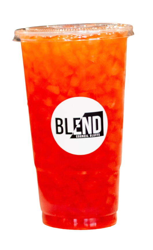 An iced orange-colored beverage in a clear plastic cup with a plastic lid and a white circular sticker labeled 'BLEND' from Council Bluffs.