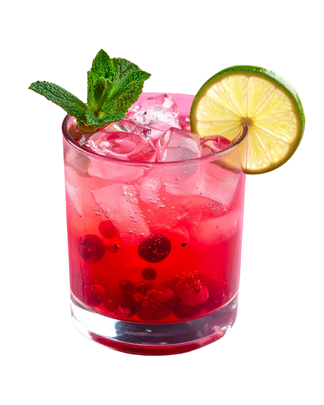 A pink cocktail with ice, garnished with a lemon slice and mint leaves, with berries at the bottom of the glass.
