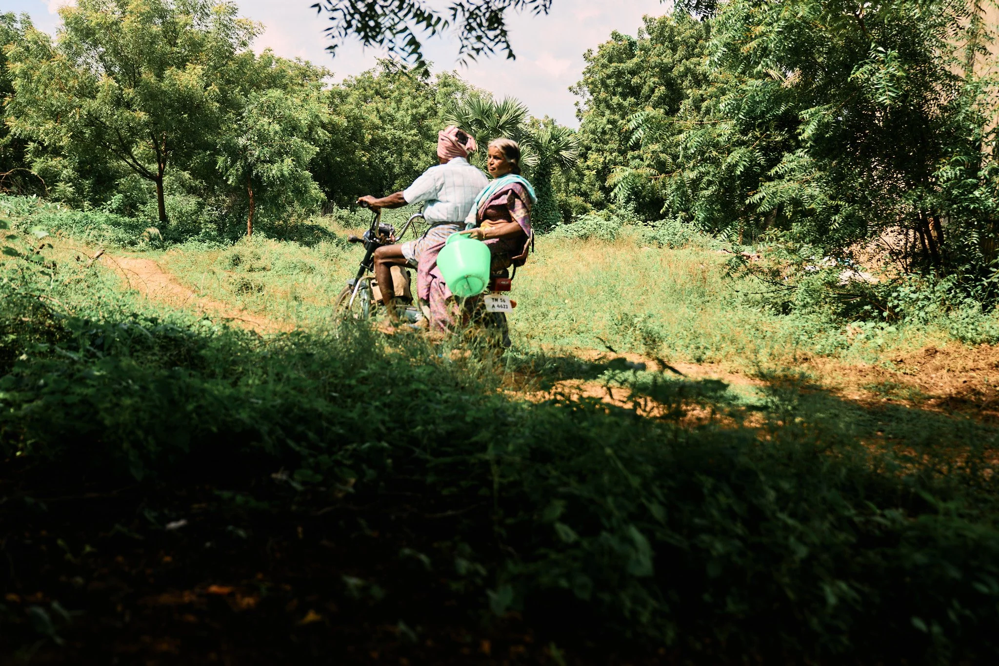 On the way to the cotton field. In India, chronic debt and crop failure have contributed to an epidemic, with roughly 48 farmer suicides per day recorded between 1995 and 2018. 

