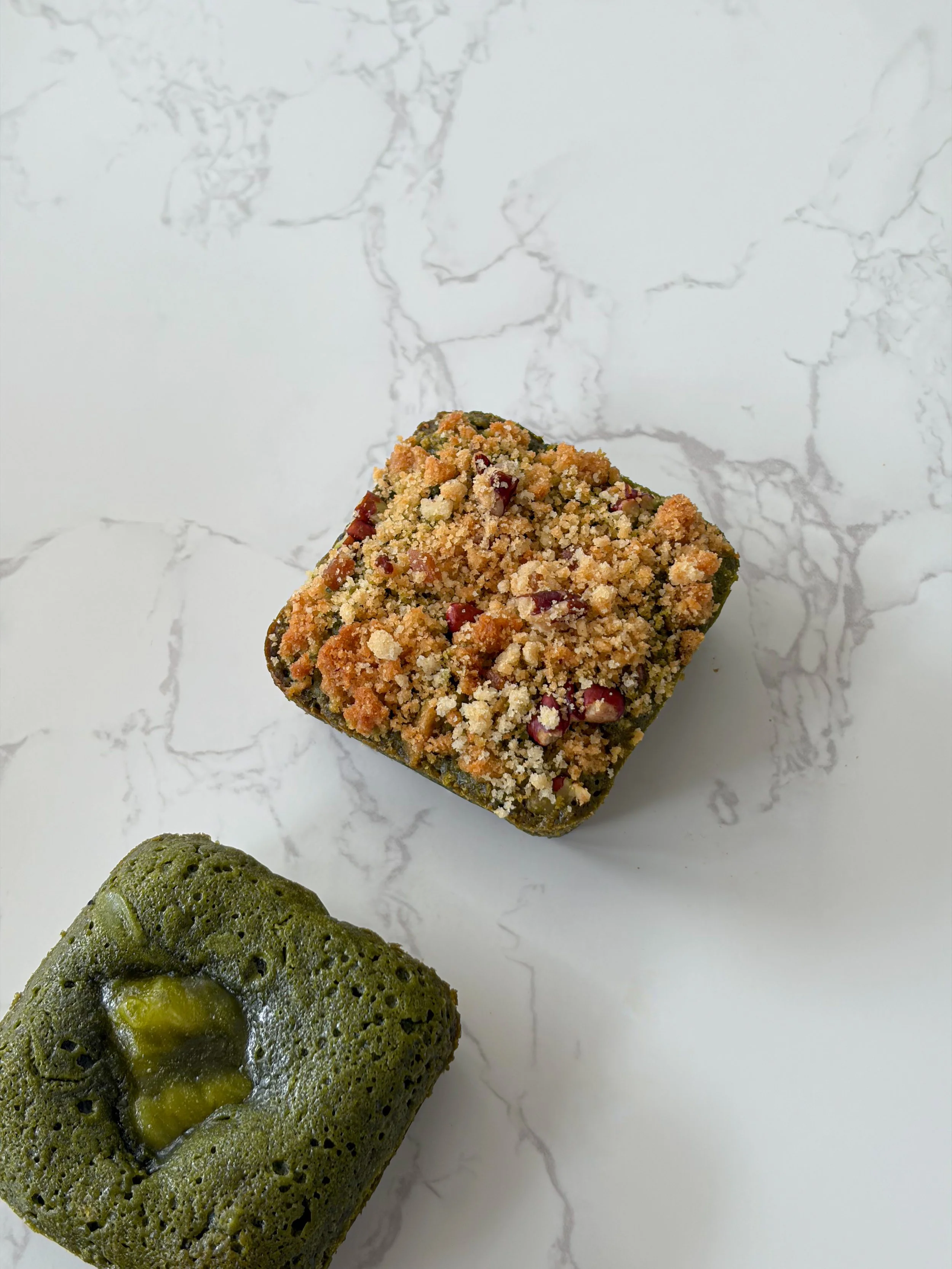 Fudgy matcha pecan crumble brownie made with ceremonial-grade matcha from a Singapore matcha bakery.