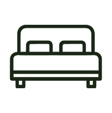 Outline of a bed with two pillows.