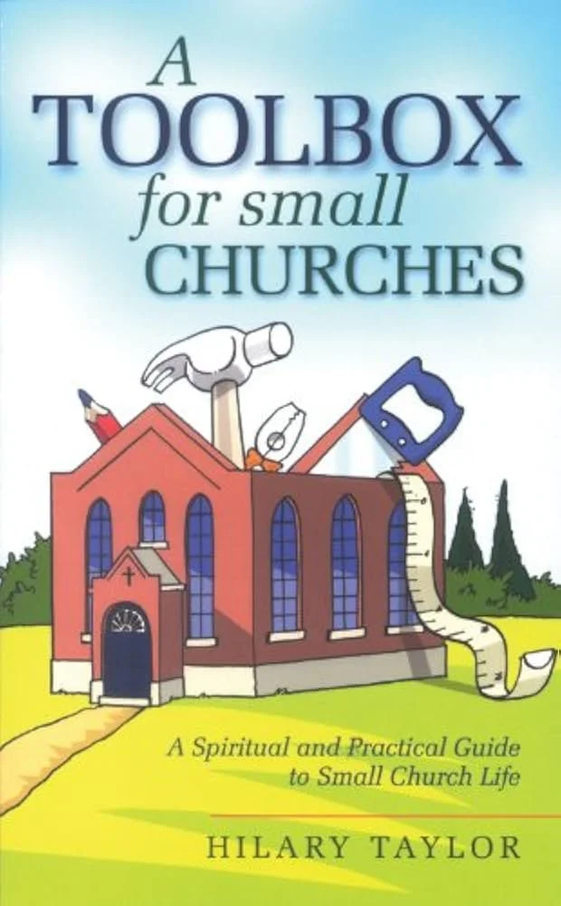 Cover of a book titled 'A Toolbox for Small Churches' featuring a church building with tools such as a hammer, saw, and tape measure emerging from the roof.