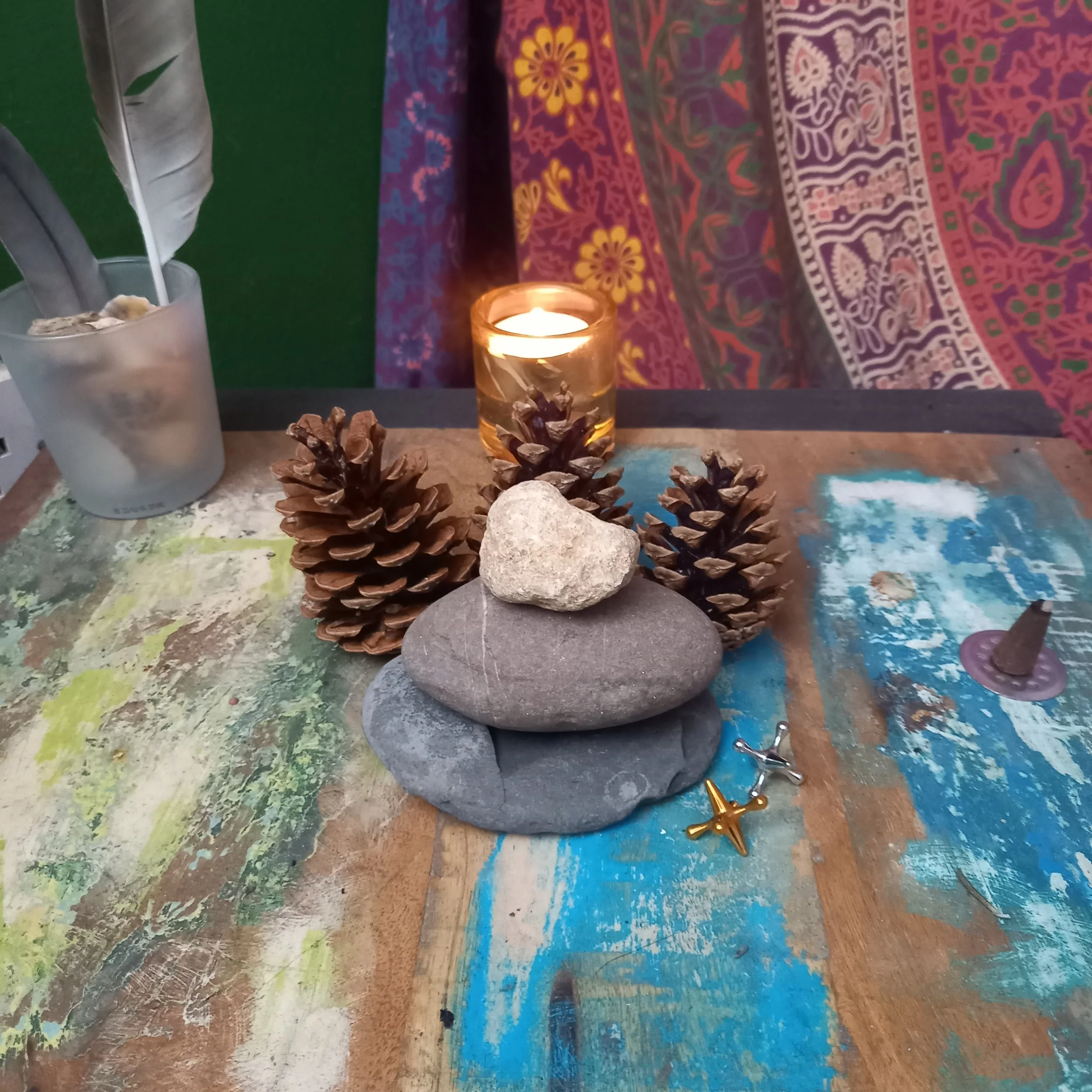 Three pine cones to join the three stones on my altar today (and a fourth as a gift to the river 💧)

I cleared my altar completely at the end of last week. Spiritually wiping the slate clean. On my walking journey this morning, it started filling wi