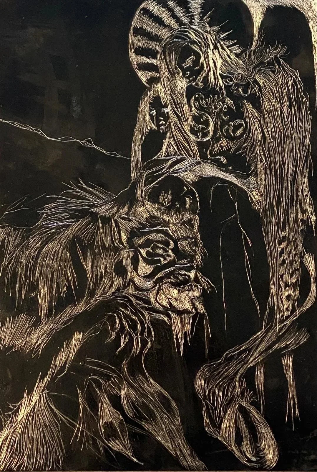 Metallic artwork depicting a lion with a lioness and several cubs, created with intricate line work on a dark background.
