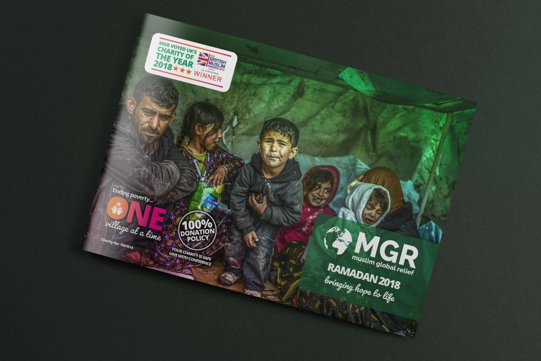 Brochure for MGR Muslim Global Relief Ramadan 2018 with a cover photo of children and a man in a refugee camp.