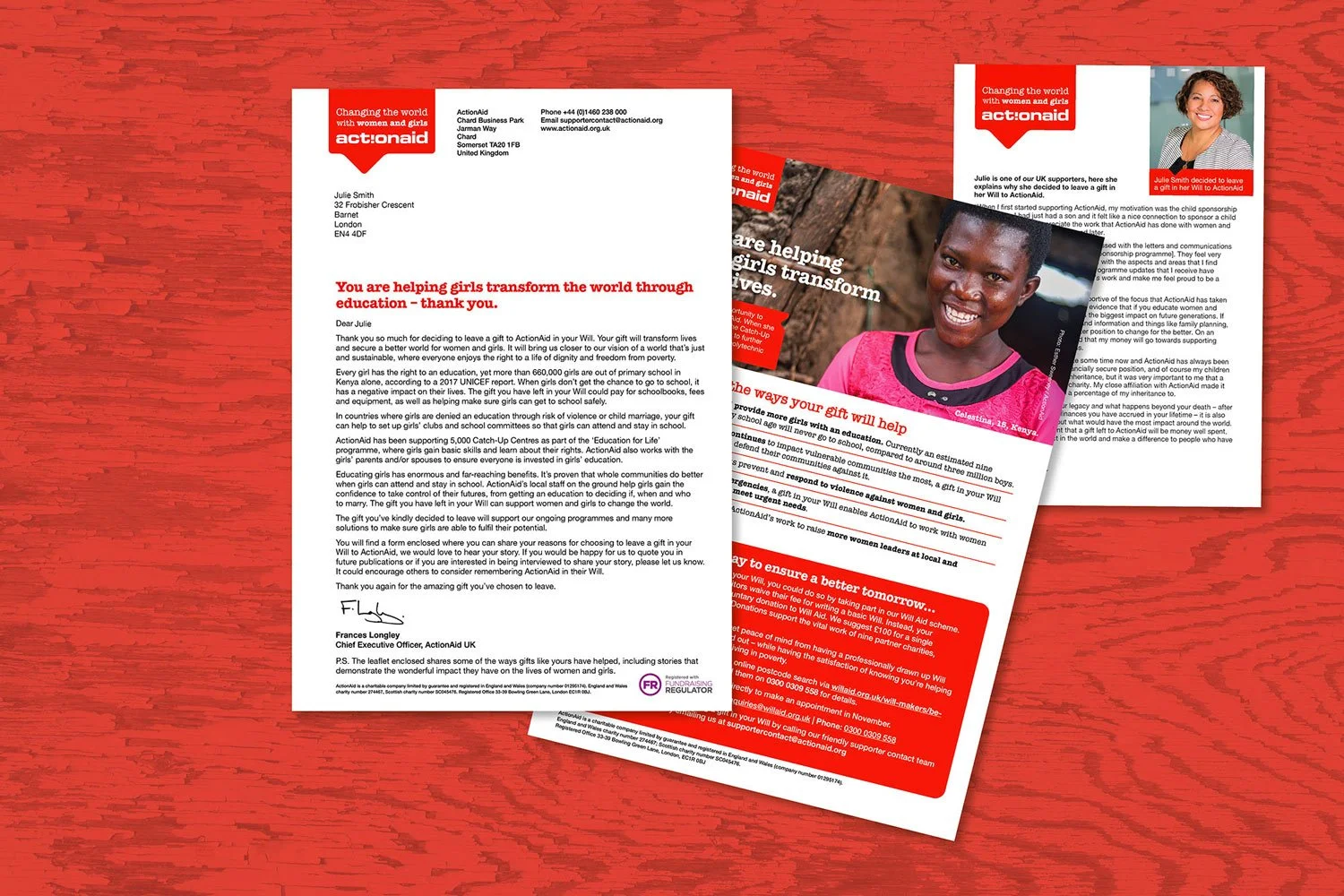 Two printed letters and a brochure on a red wooden surface, with the letters featuring text and signatures, and the brochure showing a smiling woman in a pink shirt.