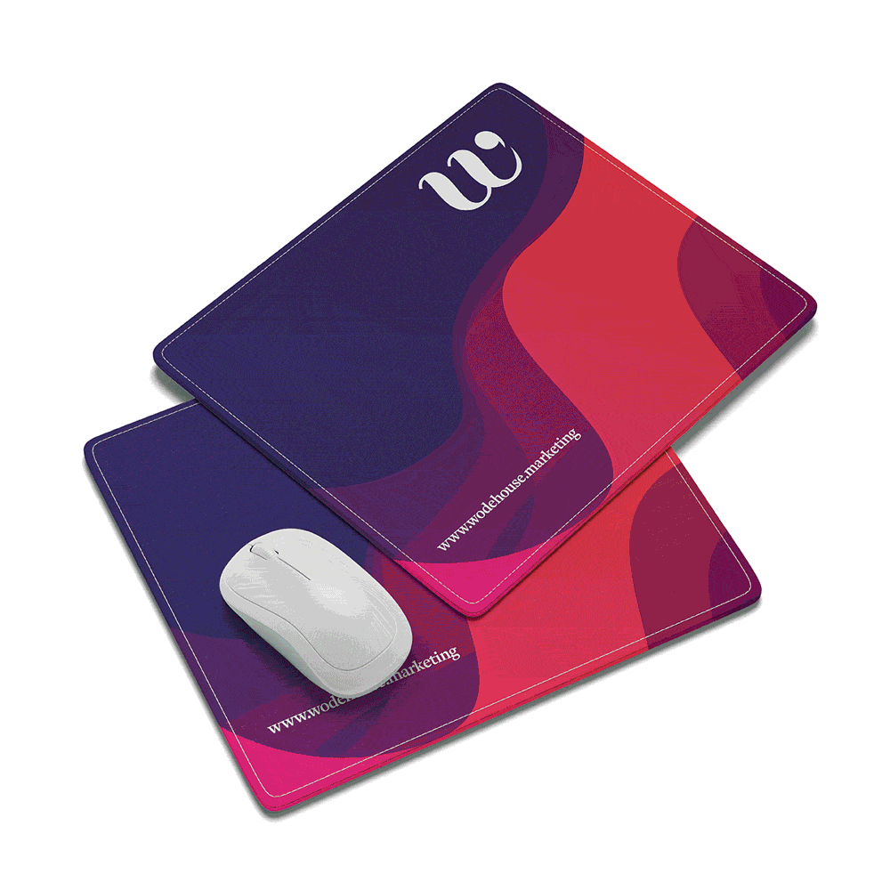 Two colorful mouse pads and a white computer mouse on a white surface.