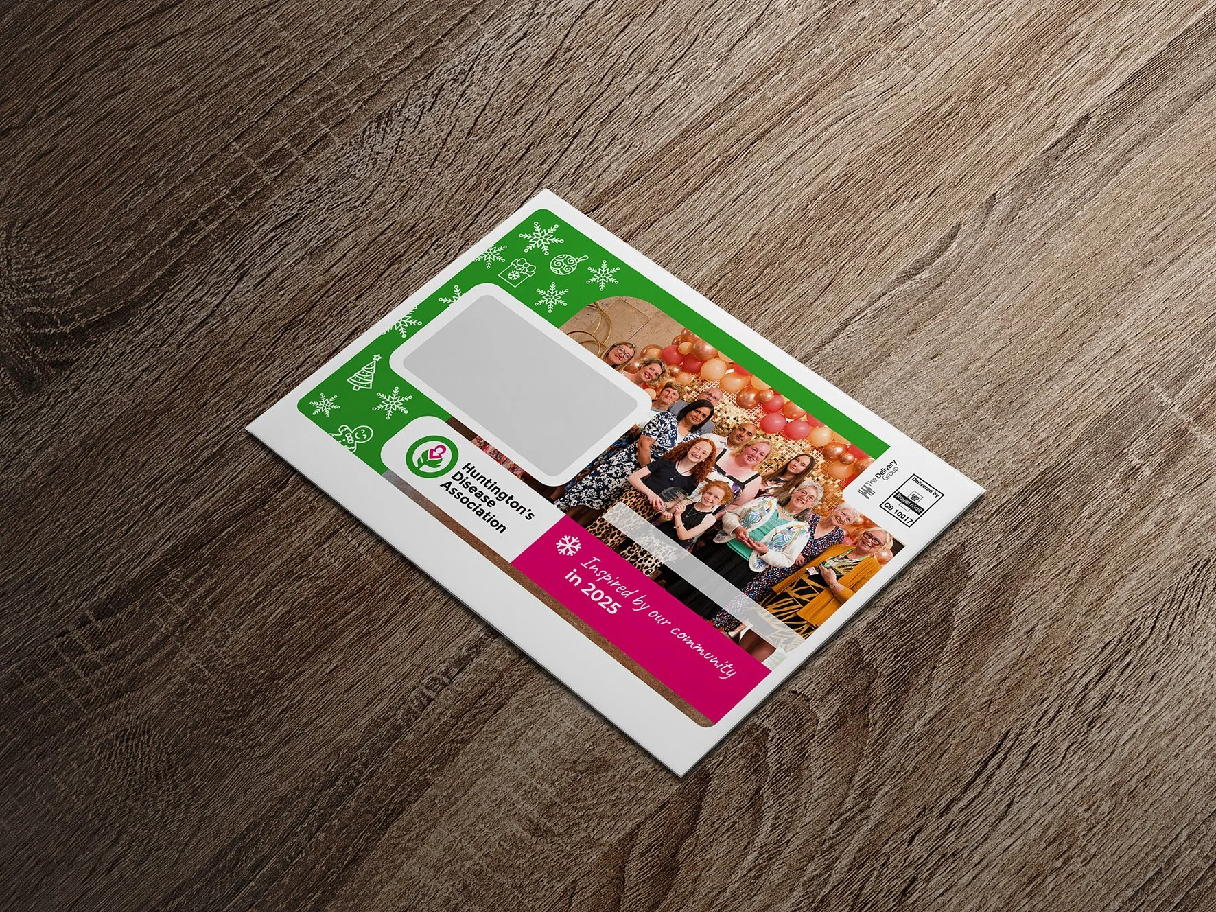 A flyer for Huntington's Disease Association featuring a group photo of diverse people at a festive event with balloons and holiday decorations, a blank rectangular space for a photo, and colorful text and graphics.