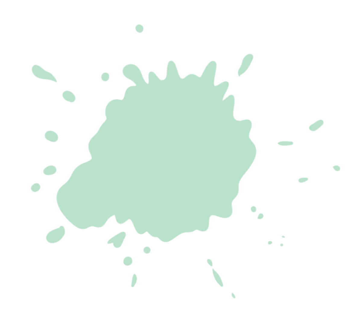 Tache de peinture verte éclaboussée sur un fond noir.