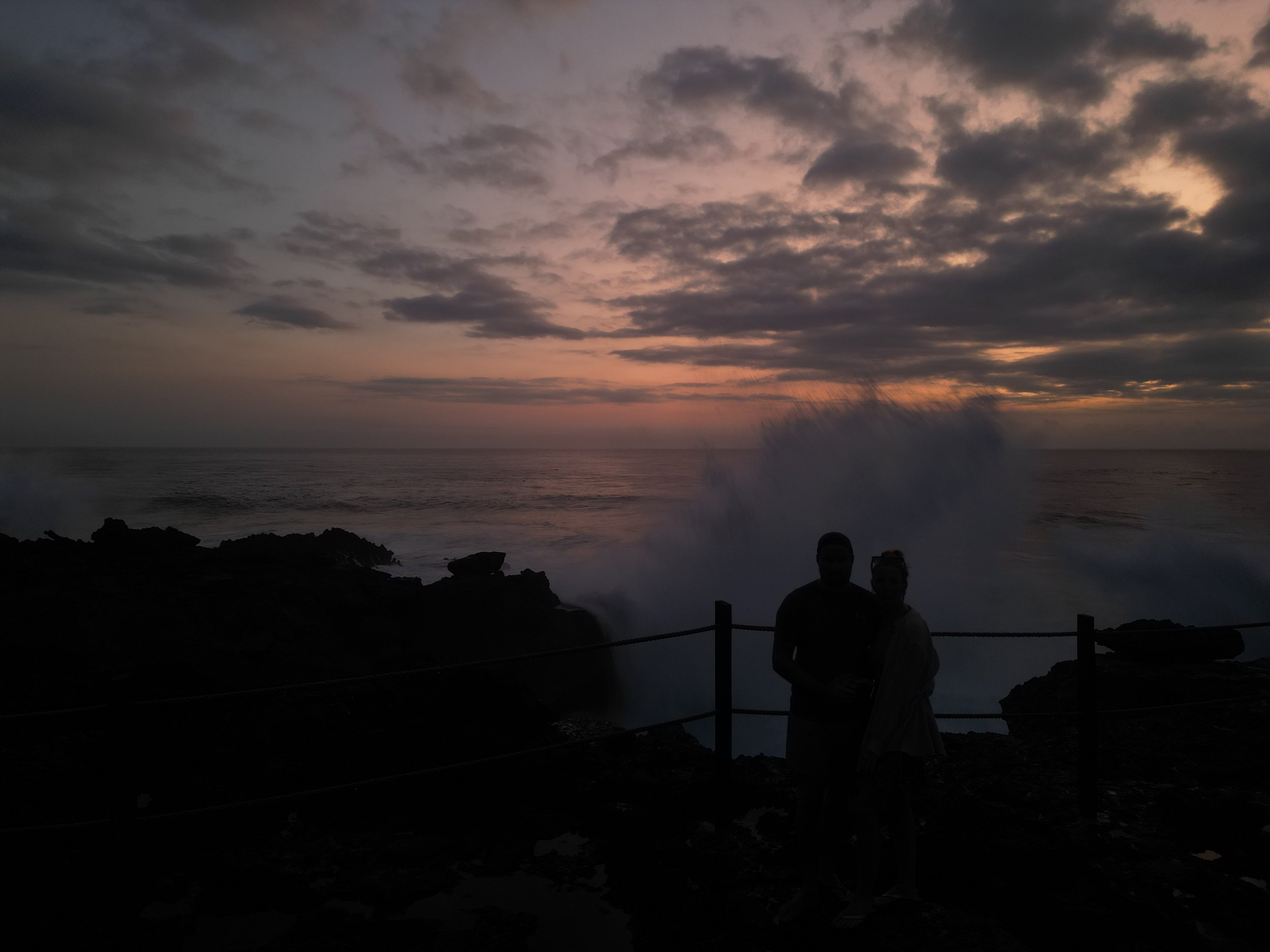 Water splashes against the cliffs at sunset at devils tears, Nusa Lembongan