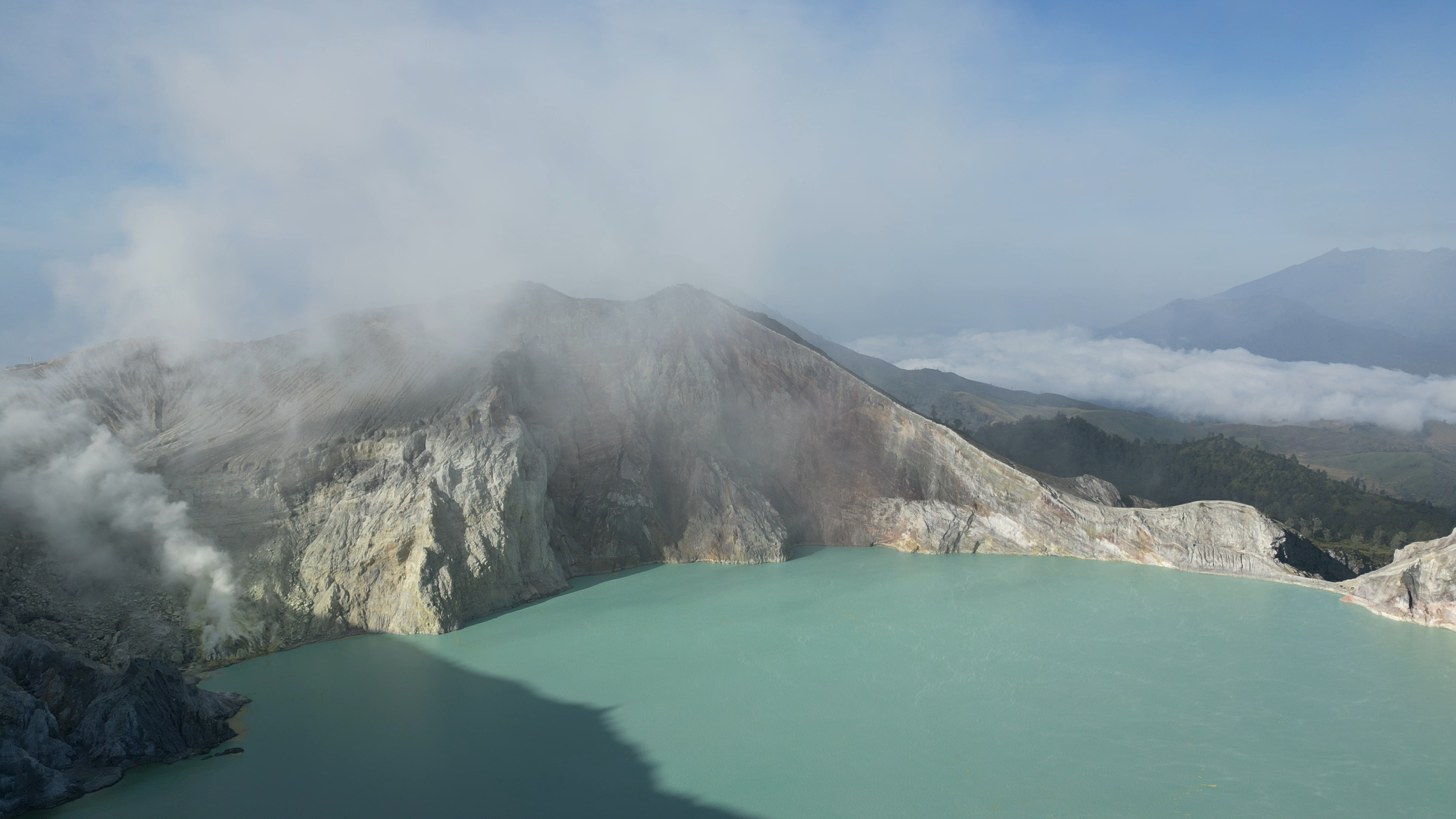 View from the kawah ijen crate on the sulfur lake, Java, Indonesia