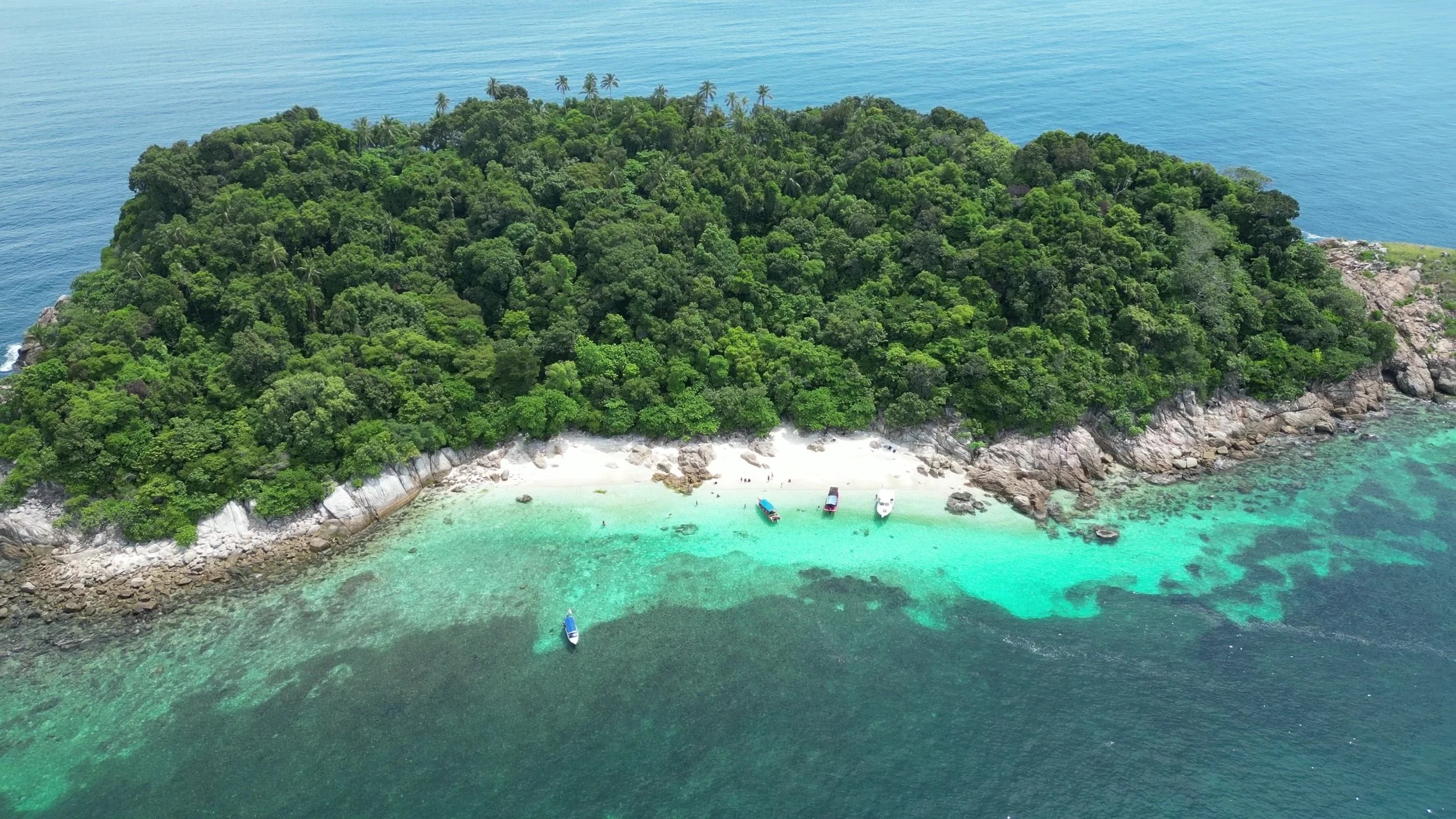 Drone shot of Rawa island during our snorkelling day trip