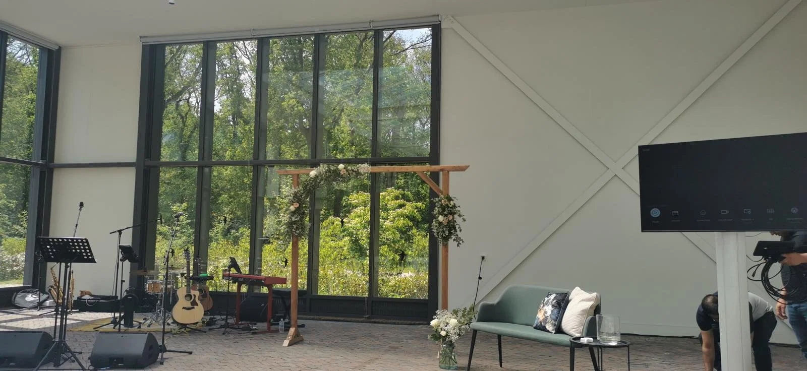 Instruments on the left. Flower arch set up with bench setup on the right