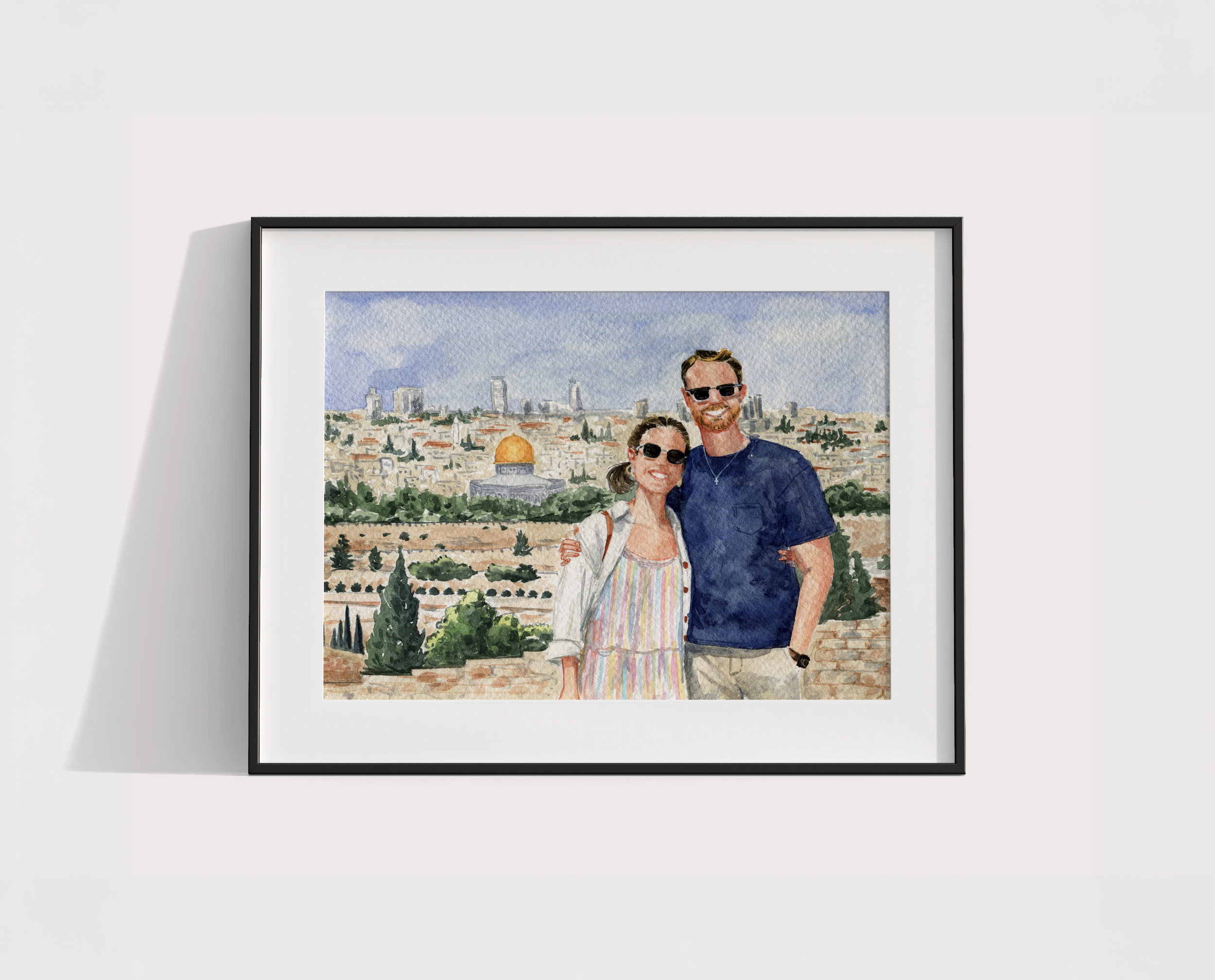 Watercolor painting of a smiling couple standing outdoors with a cityscape in the background, featuring the dome of the Rockefeller Museum and the skyline of Jerusalem.