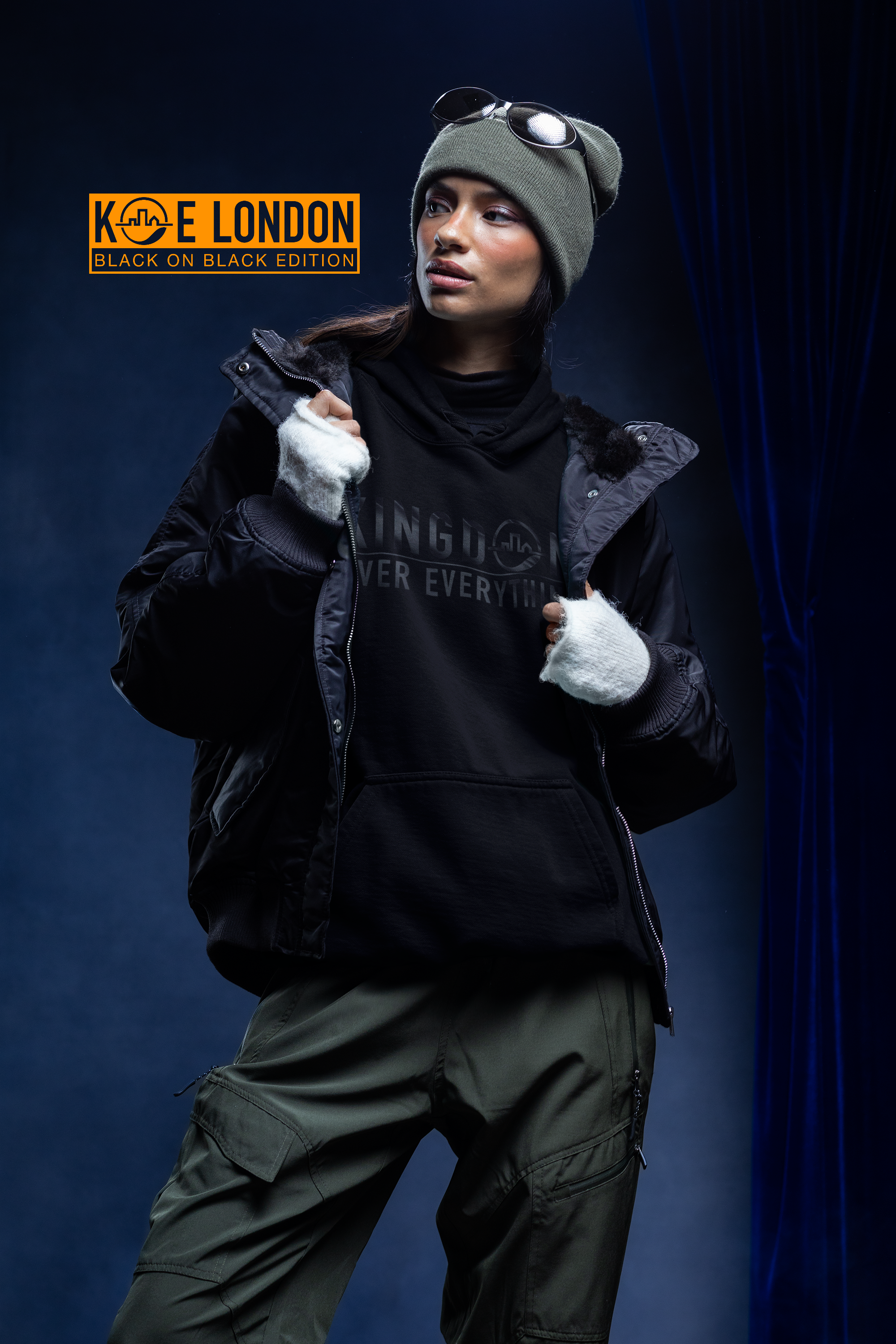 comfort-colors-1567-hoodie-mockup-featuring-a-woman-with-a-serious-look-posing-in-a-winter-setting-m59244.png