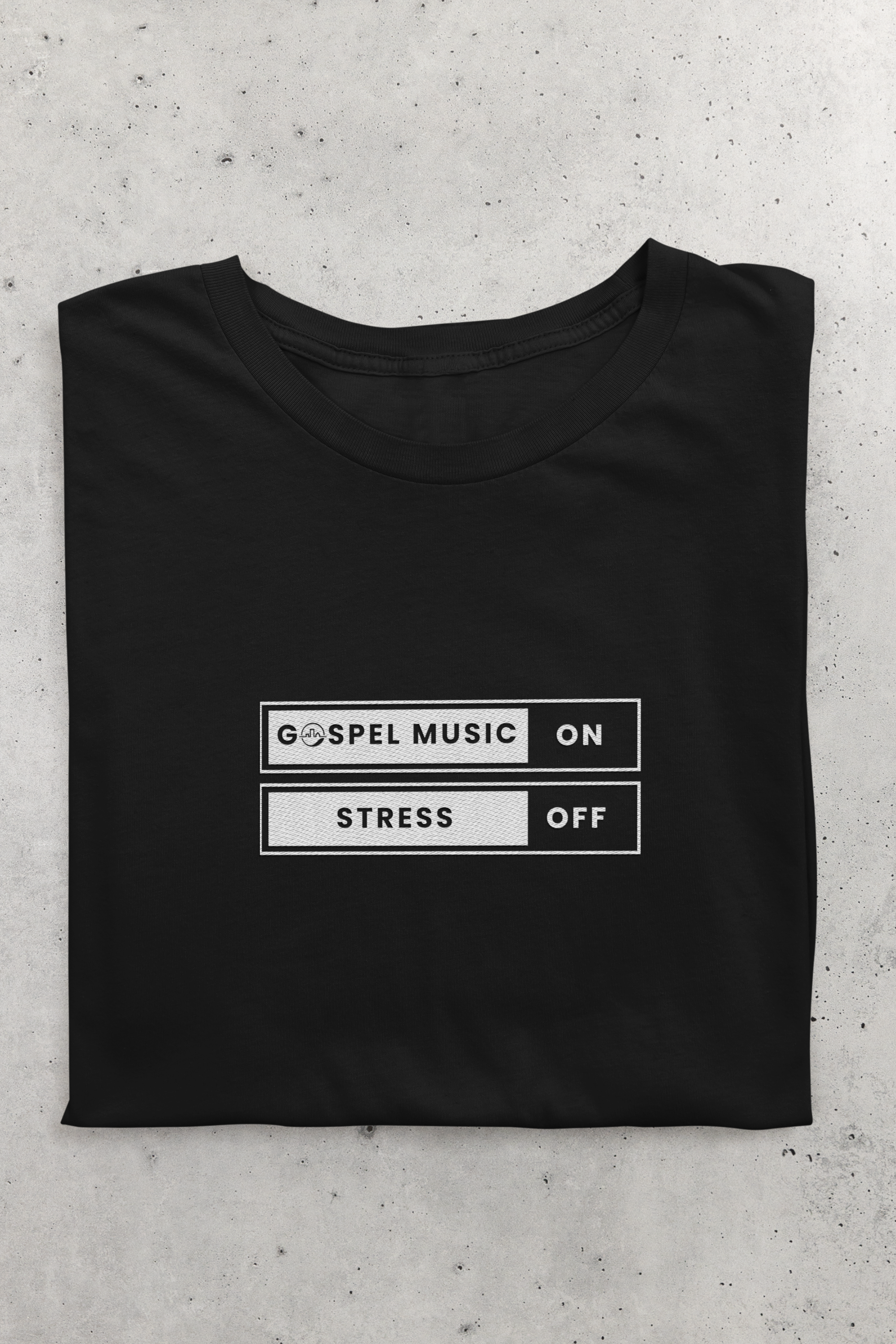 mockup-of-a-folded-bella-canvas-t-shirt-featuring-embroidered-elements-m33059.png