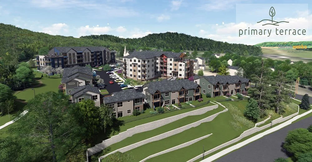 A rendering of a residential complex named Primary Terrace with apartment buildings, townhouses, parking lots, and surrounding greenery, set against a hilly landscape.