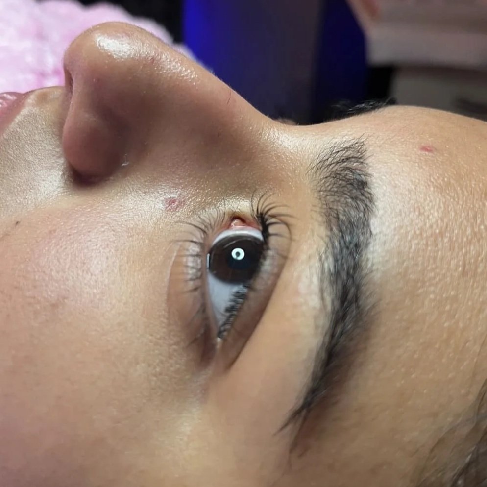 Close-up of a client's eyes after a lash lift treatment, showing lifted and curled natural lashes at Silk Skin & Wellness in Woodbridge, VA