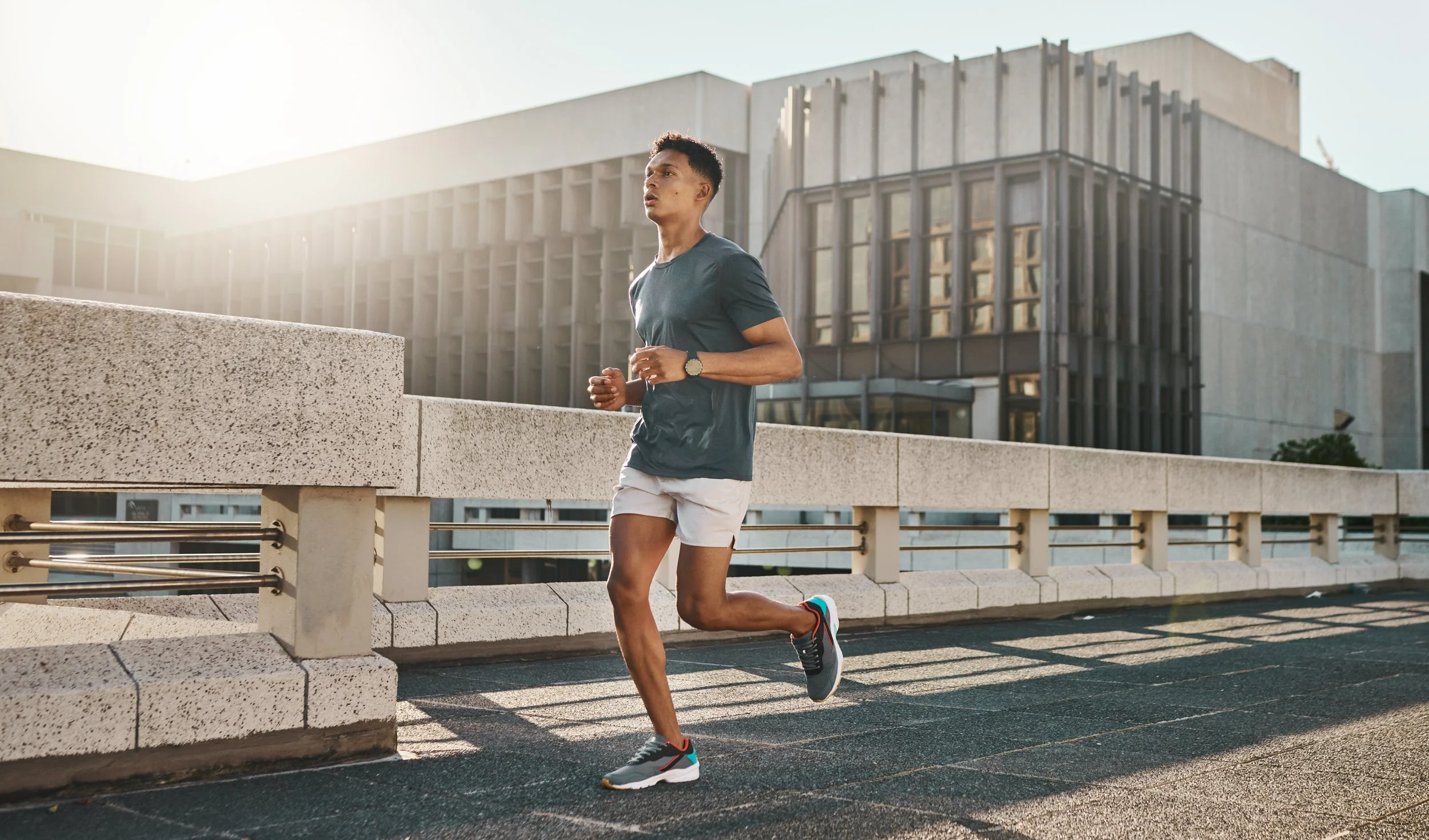 fitness men jogging outside in a city  testosterone replacement therapy