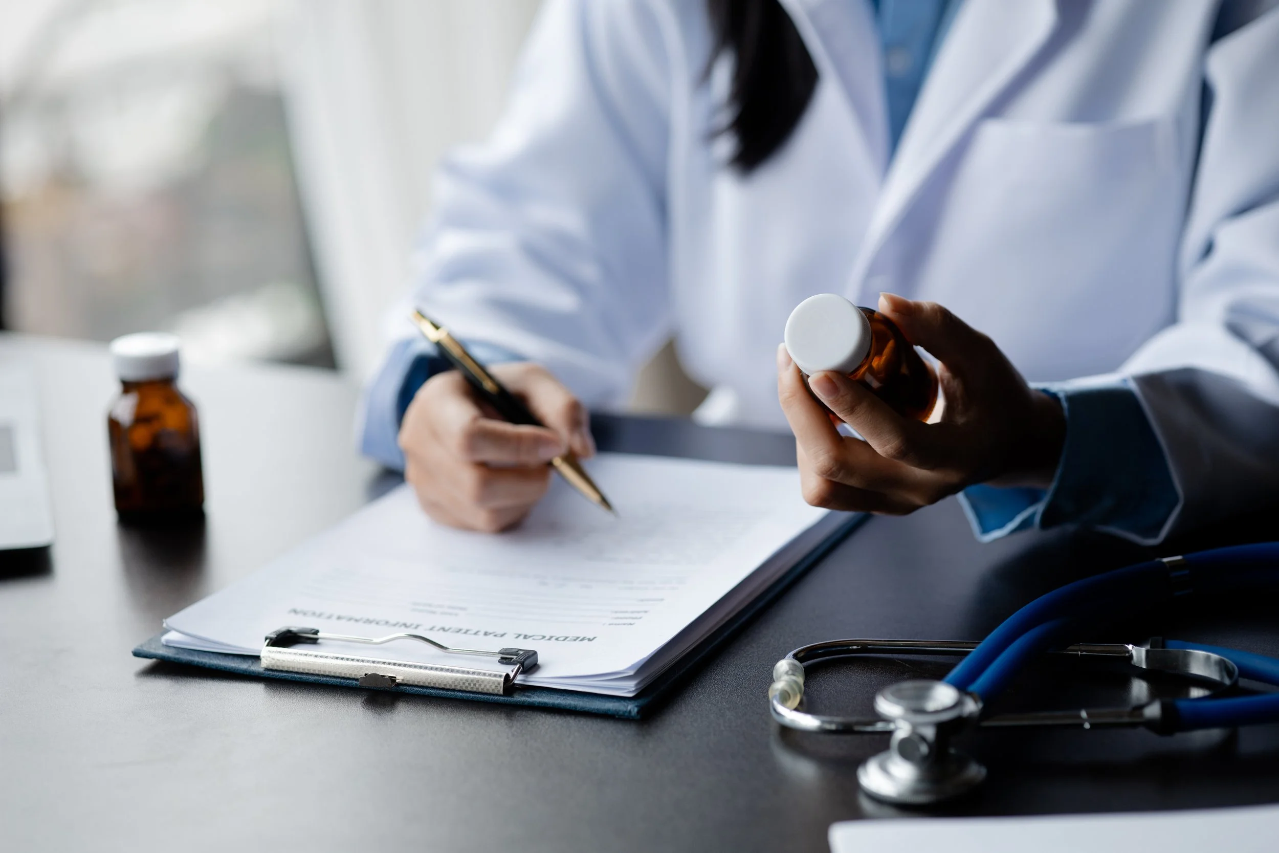 doctor looking to some advance labs results in a paper